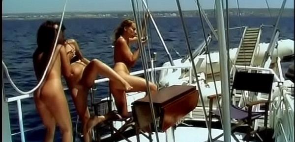  Lesbian threesome on the deck of a boat